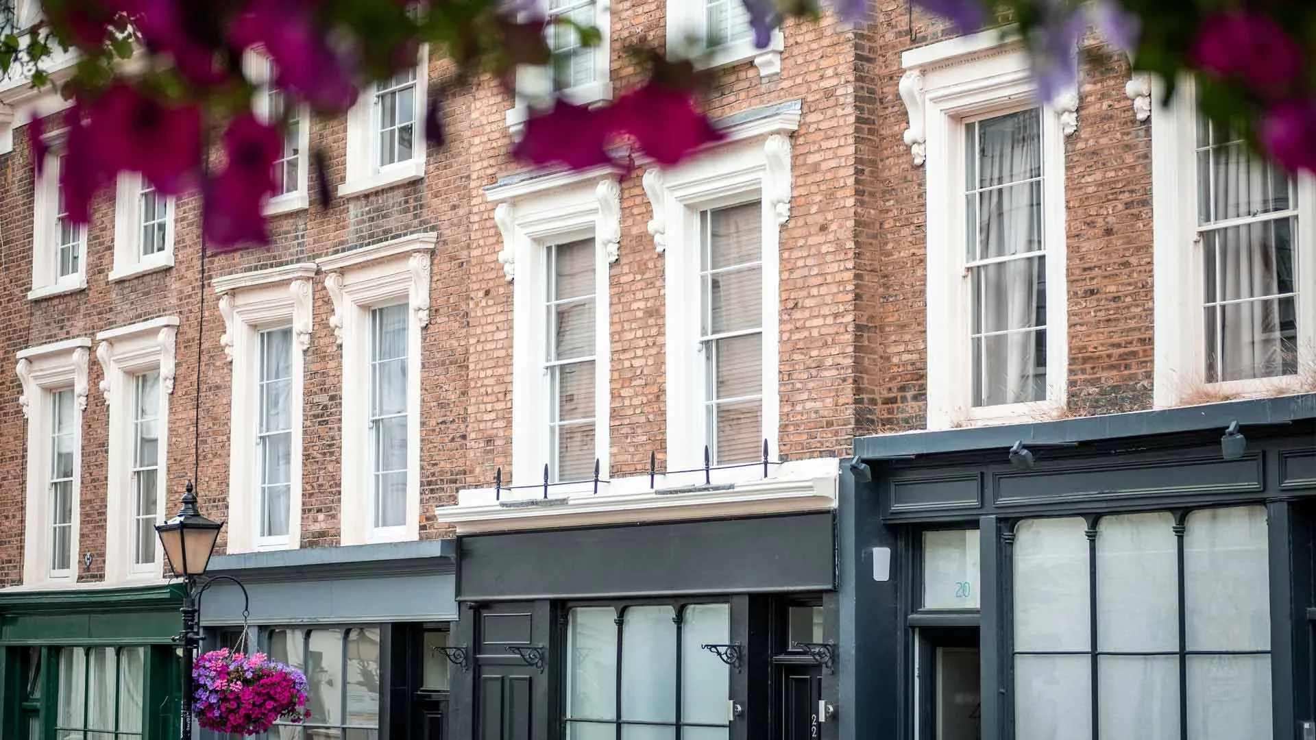historic-brick-townhouses-with-shopfronts-in-london