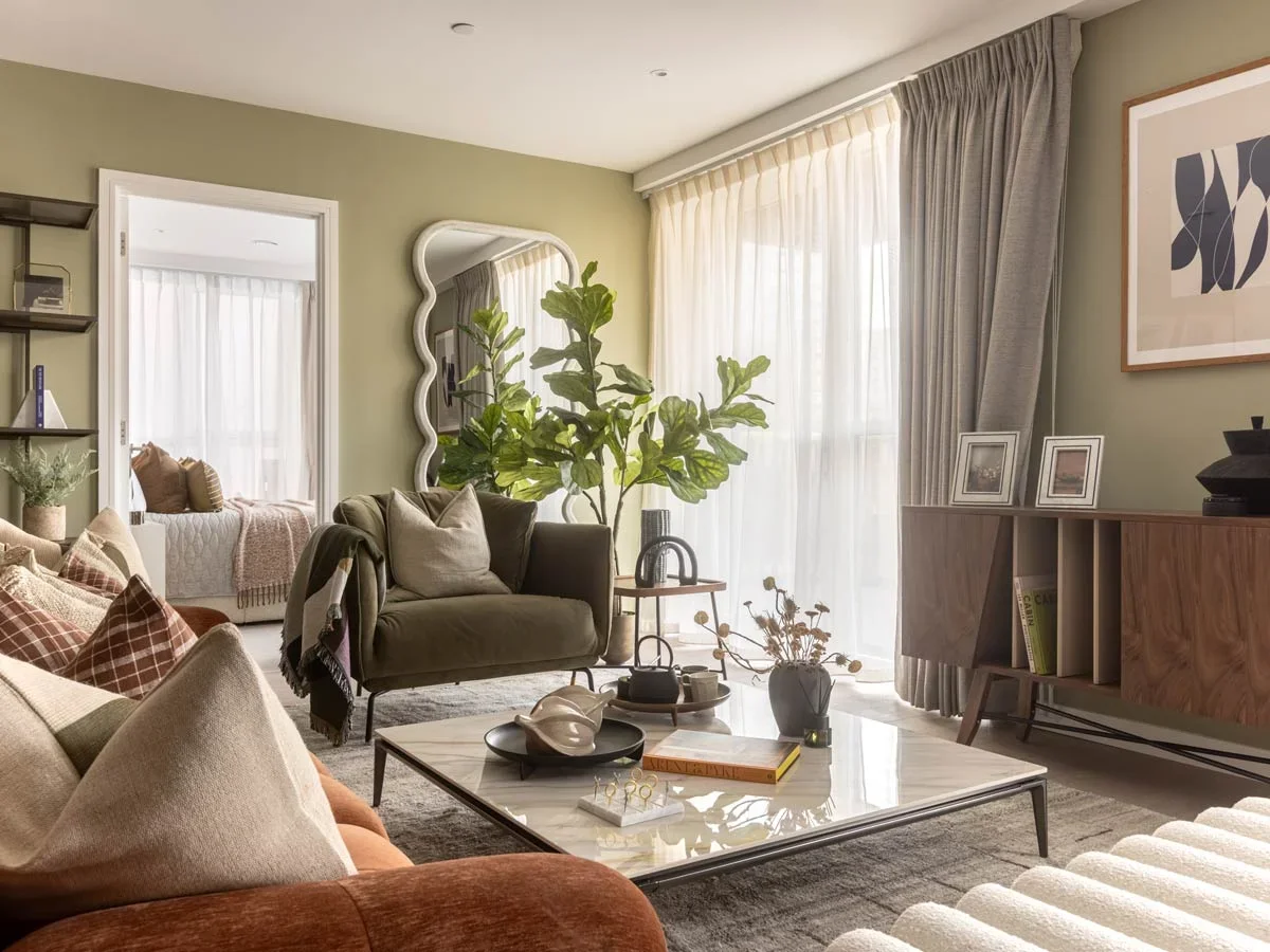living-room-with-sage-green-walls-and-marble-coffee-table