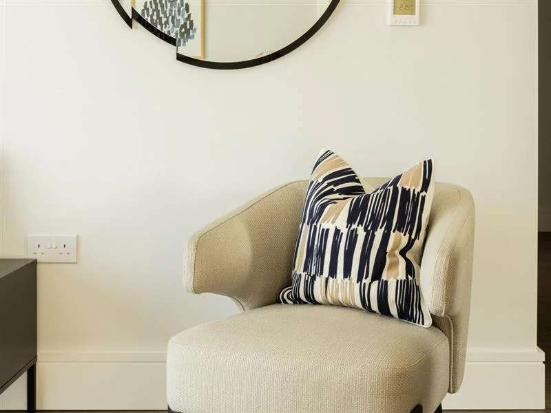 modern-accent-armchair-with-abstract-cushion-green-park-village