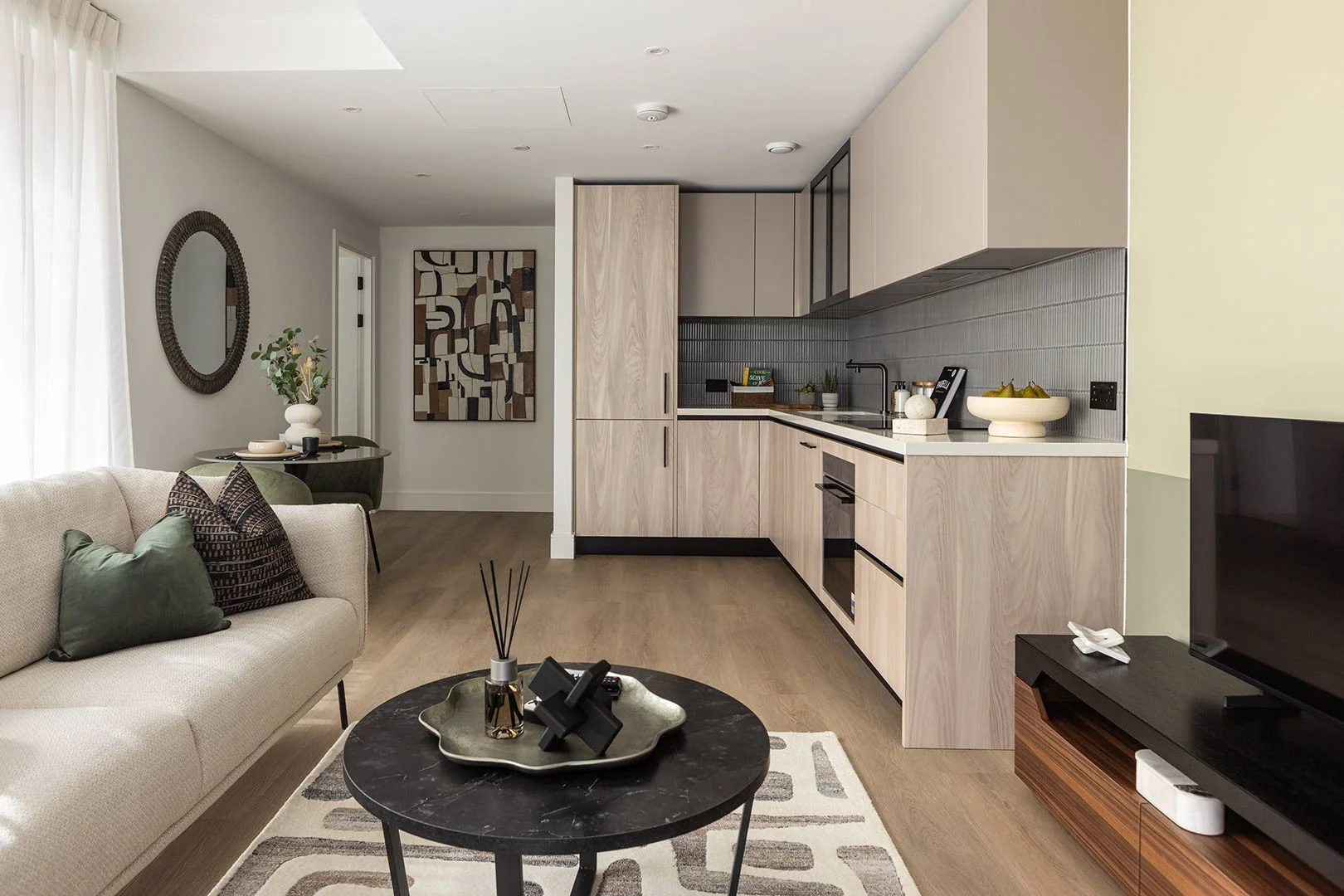 Stylish Open-Plan Apartment with Modern Kitchen and Living Area