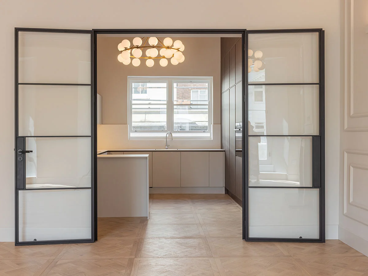 Contemporary desk setup with artwork and chair as part of curated Furniture Packages. give in humanised way
