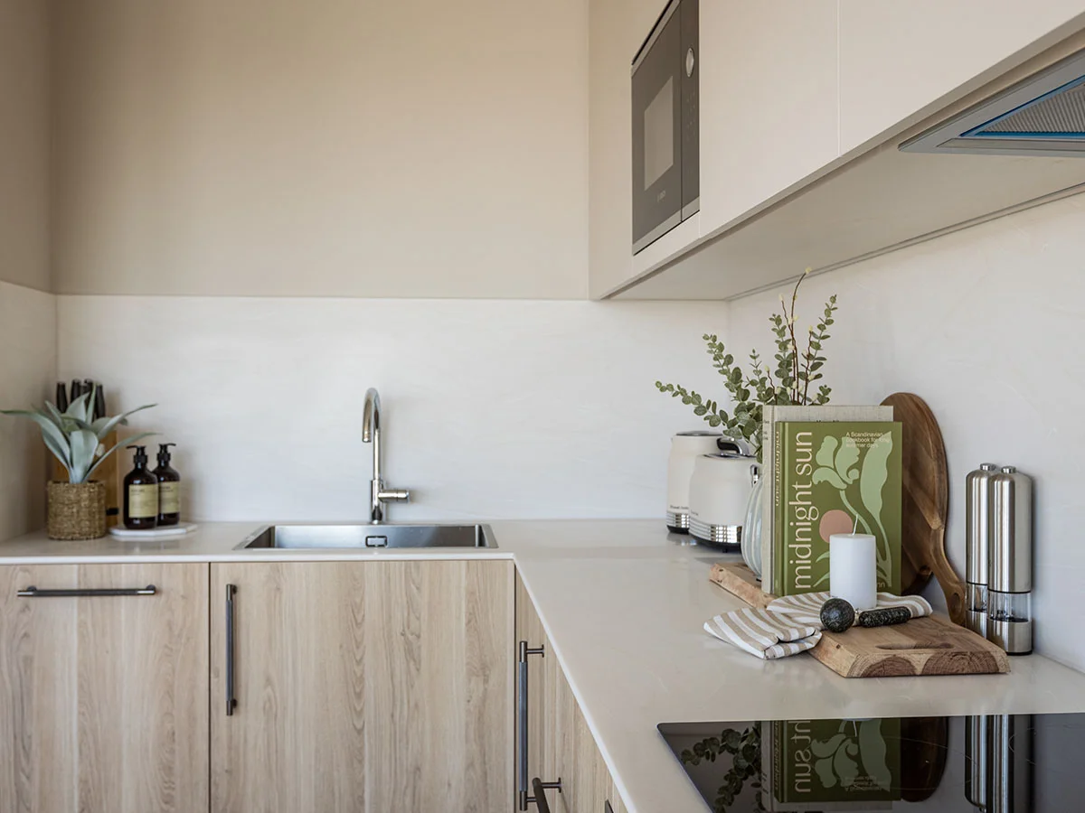 Private balcony with outdoor seating and views across the West End Gate residential development in London