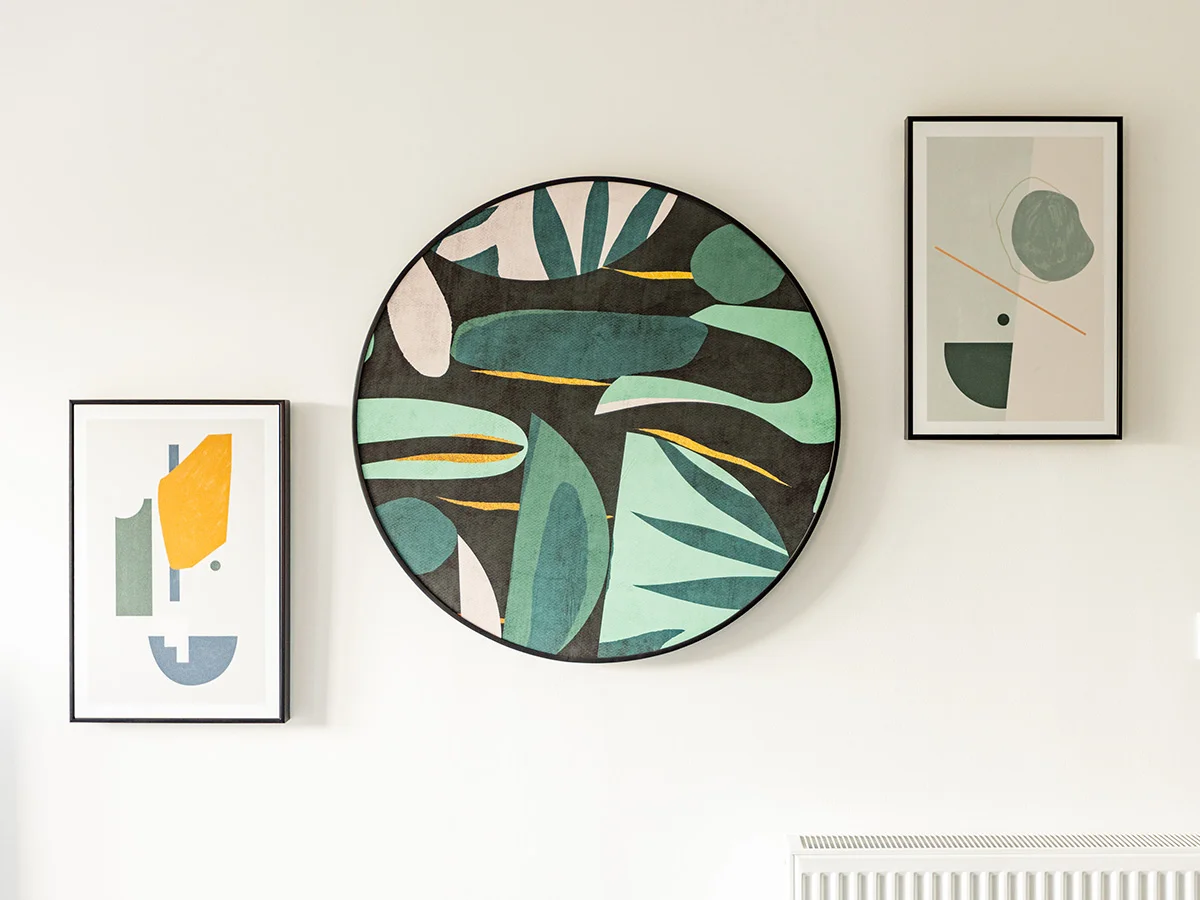 Contemporary abstract wall art creating a stylish focal point in a professionally furnished London apartment.
