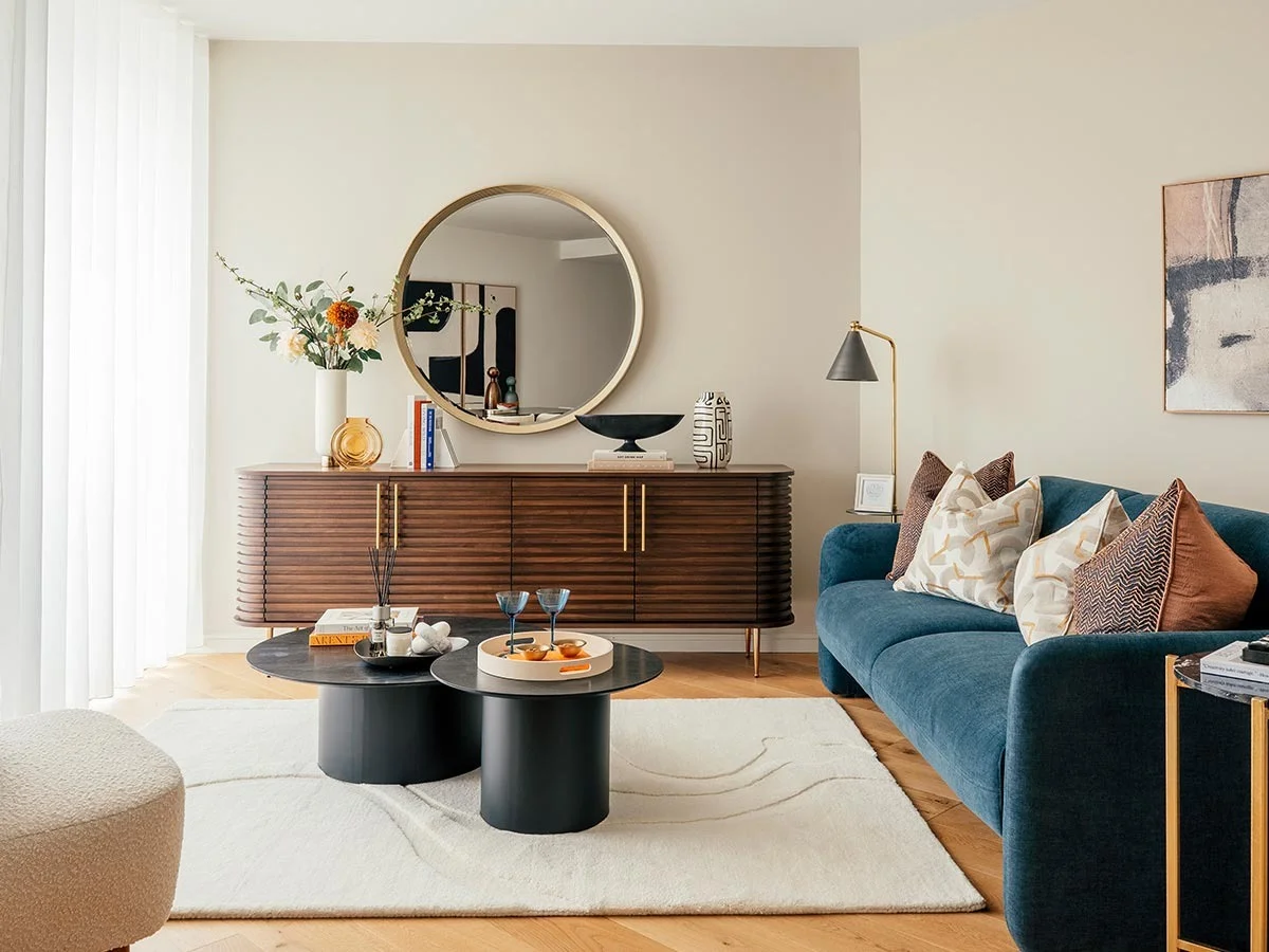 Modern dining space with styled table and artwork, reflecting interior design services in Dubai