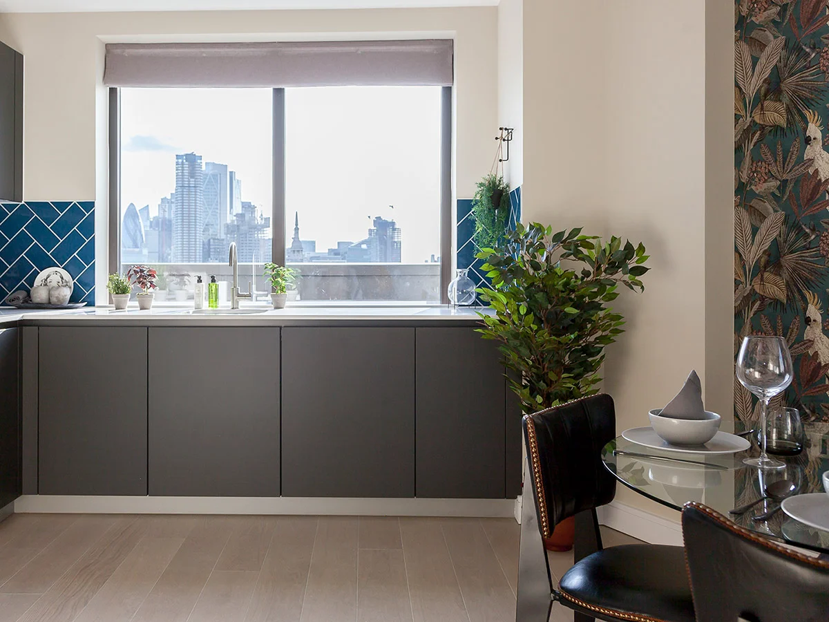 Simple kitchen roller blinds with modern city view interior styling